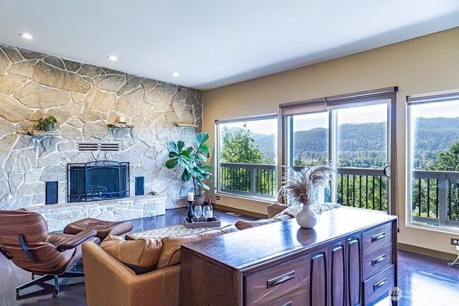 Step outside to the full length deck spanning the entire back of the home. | Image 5
