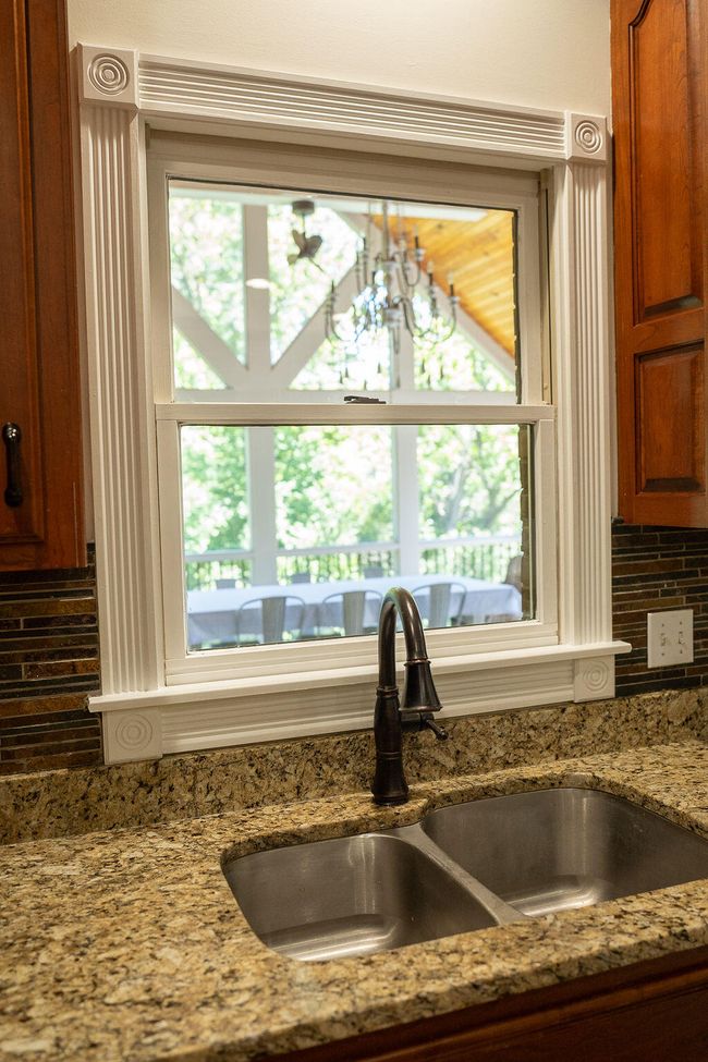 Kitchen sink with window. | Image 23