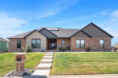 View of front facade with a front lawn, brick mailbox and front walk | Image 1