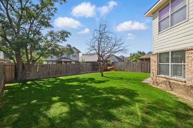 View of yard with a residential view | Image 30