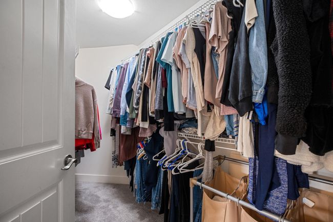 Walk in closet with carpet flooring | Image 22