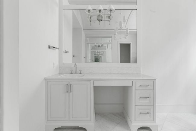"Her" vanity also offers a built-in vanity space with in-drawer organization for blowdryers/iron/curler etc. | Image 25