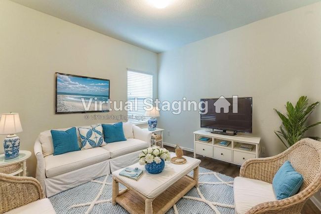 Virtually Staged - Office/ Bonus Room- Living area featuring dark wood-style flooring and baseboards | Image 9