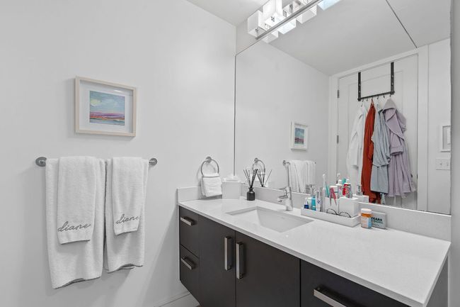 Bathroom with vanity and baseboards | Image 18