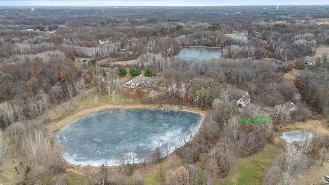 View looking north showing larger pond and house labeled on right side. | Image 68