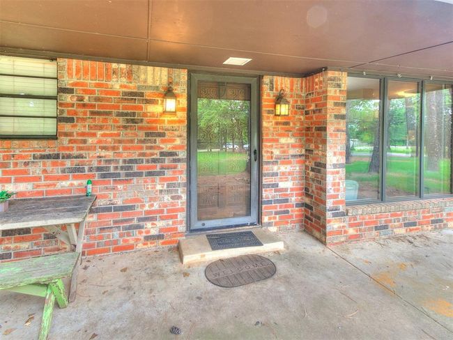 Entrance to property featuring brick siding | Image 27