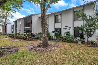 H1 - 1281 Pine Ridge Circle E, Condo with 3 bedrooms, 2 bathrooms and null parking in TARPON SPRINGS FL | Image 2