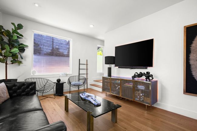 Living room with hardwood / wood-style flooring and recessed lighting | Image 7