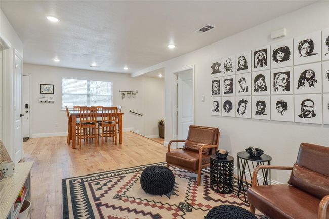 Living room featuring light wood-type flooring | Image 6