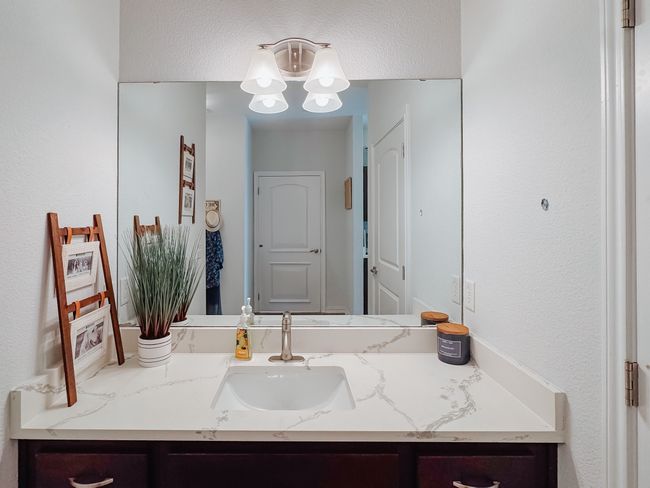 Bathroom in lockout unit. Updated counters. Toilet and shower in located in their own room. | Image 22