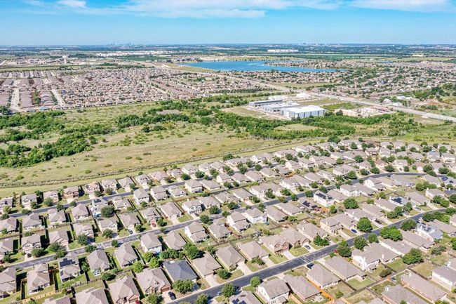Aerial overview of property's location featuring a large body of water | Image 4