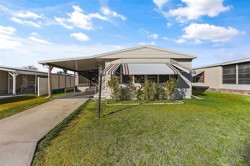 637 Periwinkle Cir, Barefoot Bay, FL, 32976-7676 | Card Image