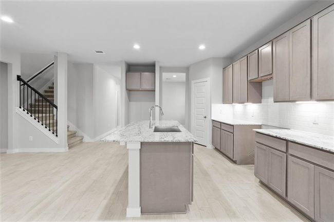 This photo is for illustrative purposes only and is not to be considered an exact replica of the finished home. Rendering does not match the finished product in terms of features, colors, landscaping, etc. Pricing, specifications, square footage and materials are subject to change at any time and without notice. | Image 4