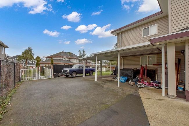 View of parking / parking lot with a gate | Image 12