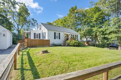 View of front facade with a front yard | Image 3