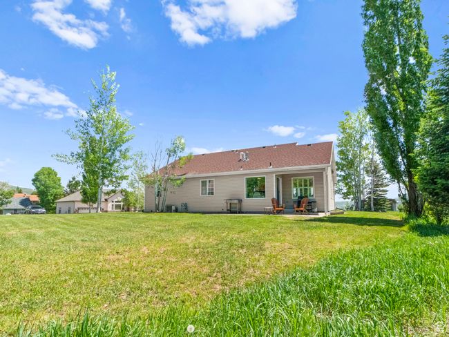 Back of property featuring a lawn and a patio | Image 22