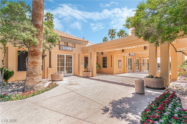 Back of property featuring stucco siding and a tile roof | Image 43