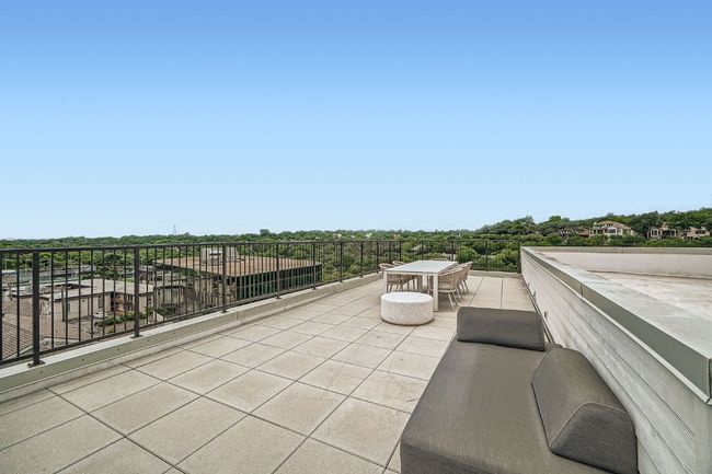 View of patio with outdoor dining space | Image 28