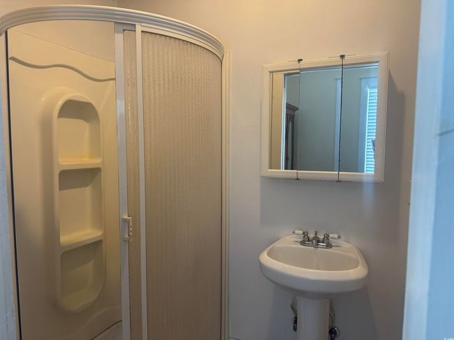 Bathroom featuring a shower stall | Image 27