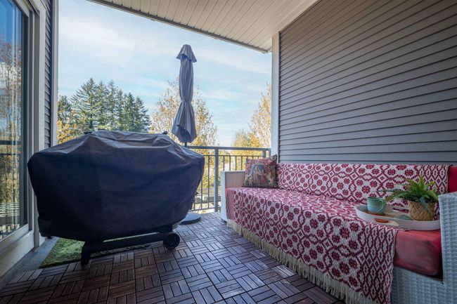 View of patio / terrace featuring grilling area and a balcony | Image 14