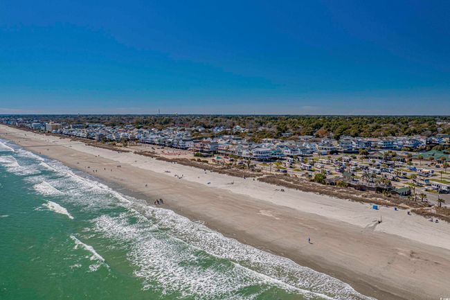 Aerial view of residential area with extended coastline | Image 25