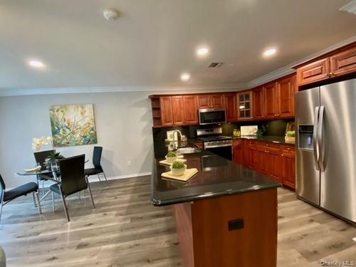 24-24 Neal Path, South Setauket, NY, 11720-4502 | Card Image