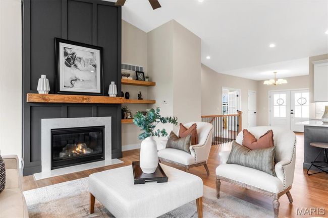 Custom gas fireplace, built-in shelving and vaulted ceilings! | Image 25