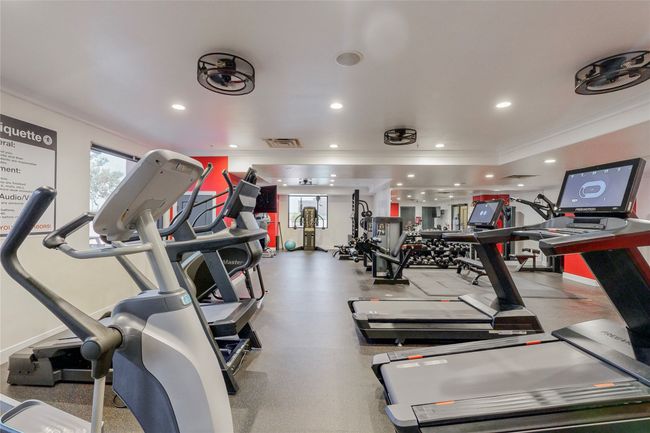 Gym featuring recessed lighting, visible vents, and ornamental molding | Image 37