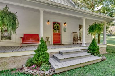 Spacious rocking chair front porch. | Image 2