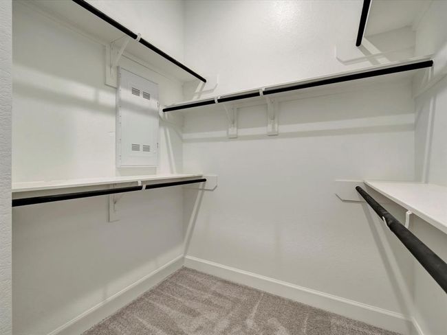 1 of 2 primary bedroom walk-in closets | Image 22