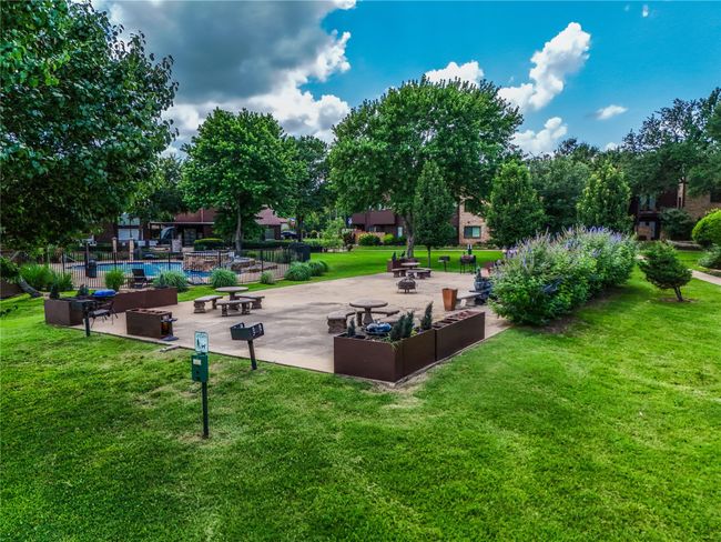 BBQ area next to the pool. | Image 21