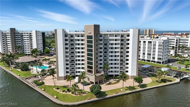 View of apartment building / complex featuring a water view | Image 36
