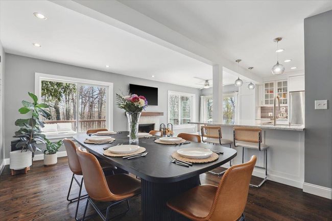 View of fenced-in yard featuring the wooden deck | Image 27