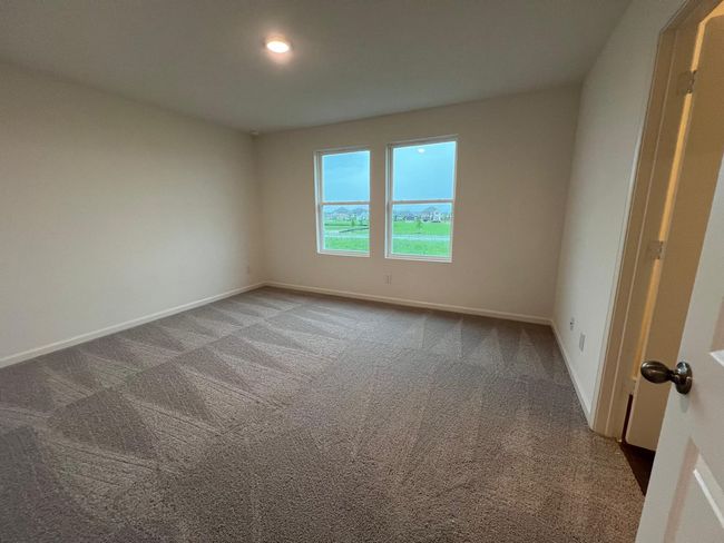 Carpeted spare room featuring baseboards and recessed lighting | Image 29
