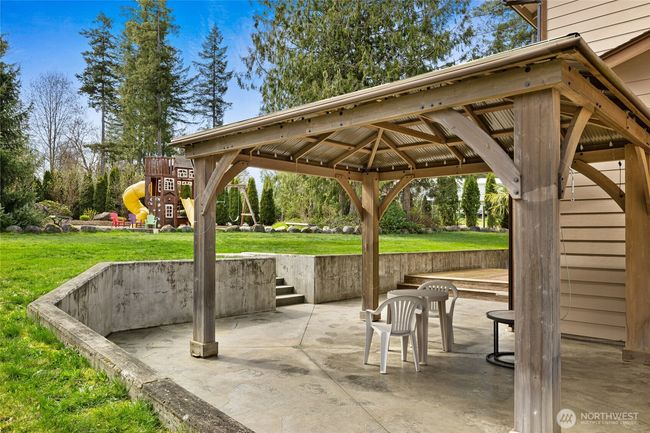 Gazebo on back stamp concrete patio | Image 27