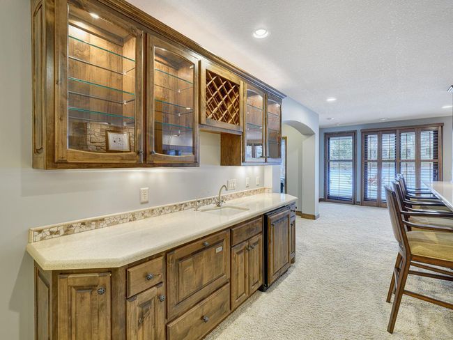 Wet bar with great storage. | Image 29