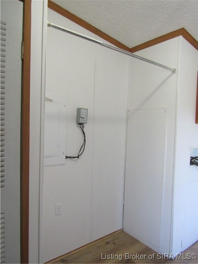 laundry closet/side entrance | Image 57