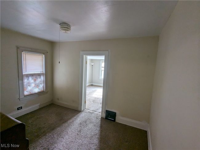 Second-Floor bedroom with dark colored carpet | Image 20