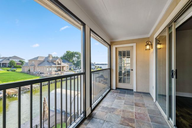 2nd floor balcony over looking the water | Image 24