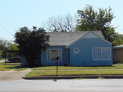 View of front of home with a front lawn | Image 1