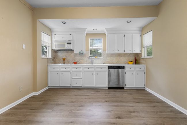 Kitchen with space for an island/bar and breakfast area | Image 11
