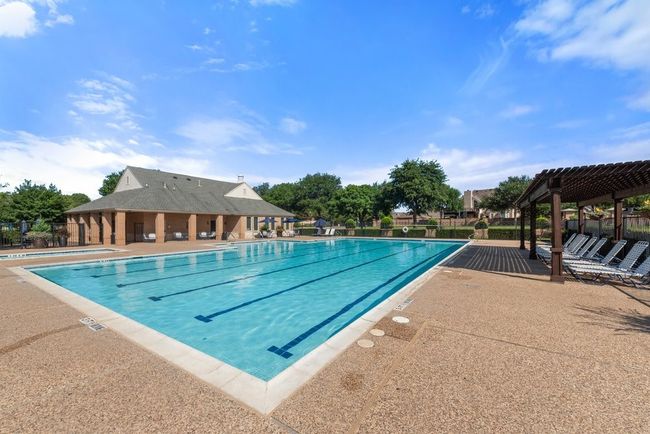 Community pool featuring a pergola and a patio area | Image 31