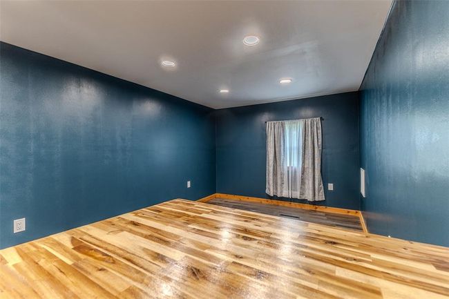 Spare room with wood finished floors and recessed lighting | Image 18