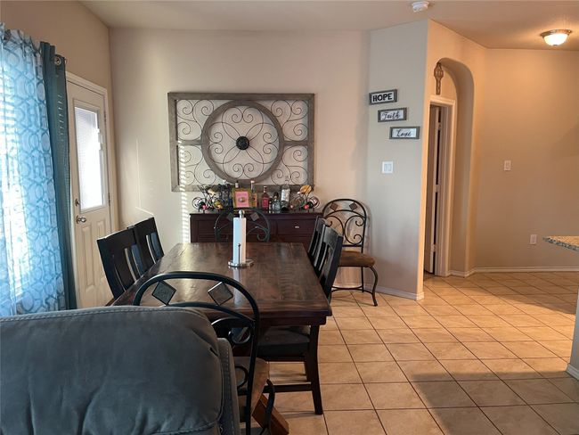 View of tiled dining area | Image 8