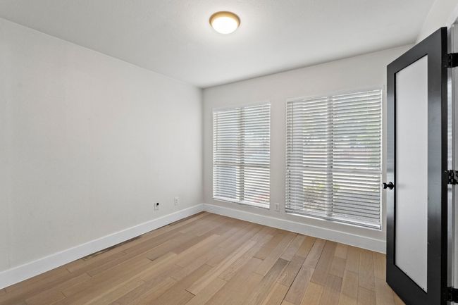 Empty room featuring baseboards and light wood-type flooring | Image 31