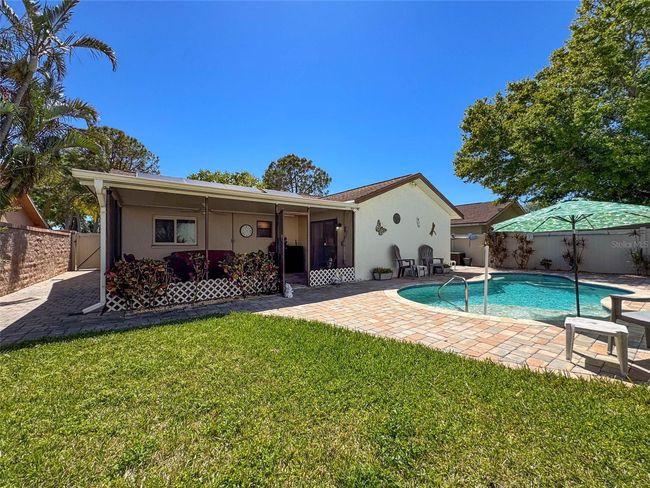 your new home has both a pool and a yard | Image 34