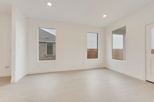 Empty room featuring light wood-style floors, recessed lighting, and baseboards | Image 5