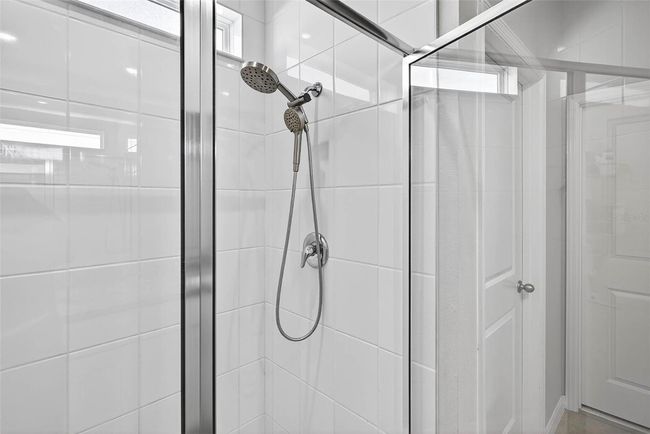 Walk in shower in the primary bath. | Image 20
