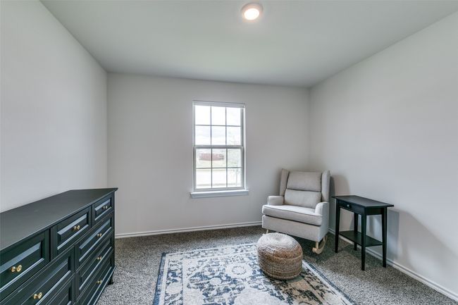 Sitting room with dark carpet | Image 19