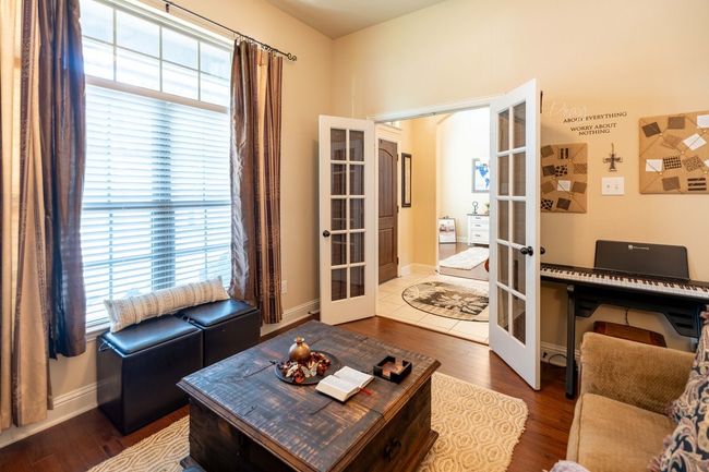 Office, study, or library with french doors and wood finished floors | Image 6